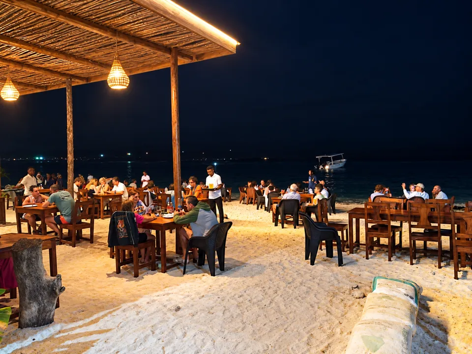 Evening service on the beach with the ocean behind