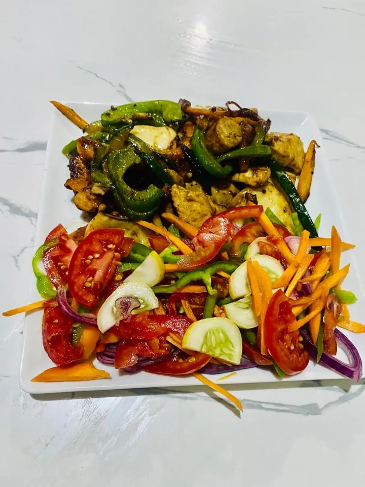 Seafood and vegetables with fresh salad